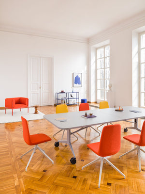 Plex Folding White Board Table on Castors with Office Chairs and Lounge Chair in Meeting Room Setting 2