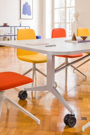 Plex Folding White Board Table on Castors with Office Chairs and Lounge Chair in Meeting Room Setting 3