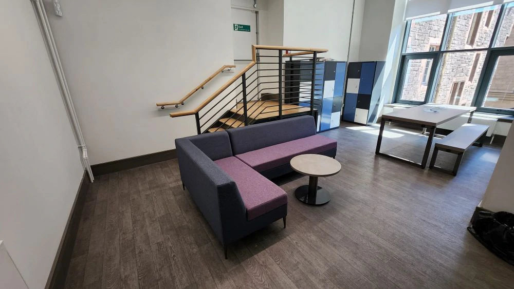 Bruce Modular Seating with Round Cylinder Based Table