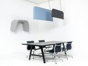 BuzziShield Acoustic Ceiling Light with Armchair and Table in Office Setting