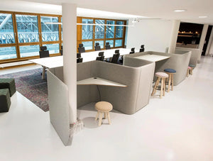 BuzziVille Modular Freestanding Acoustic Pod with Straight Desk and Stools in Open Space Settings