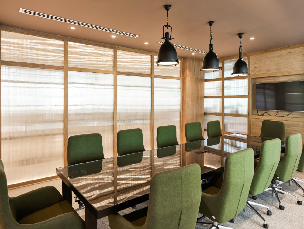 Ergonomic Chair Office Furniture In Green Finish With Long Table In Meeting Room Setting