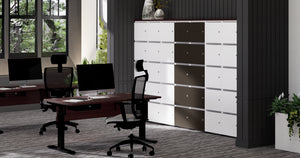 Evolve High Back Ergonomic Chair with Levo Sit Stand Desk and Uno Locker in Modern Office Setting