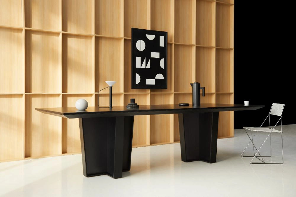 Gravos Conference Table in Black Finish with Black Abstract Art and Metal Chair in Modern Office Setting