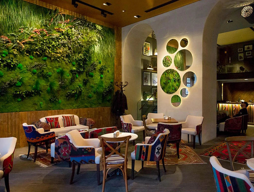 Green Mood Green Walls Forest In Passage Corner Seating Area