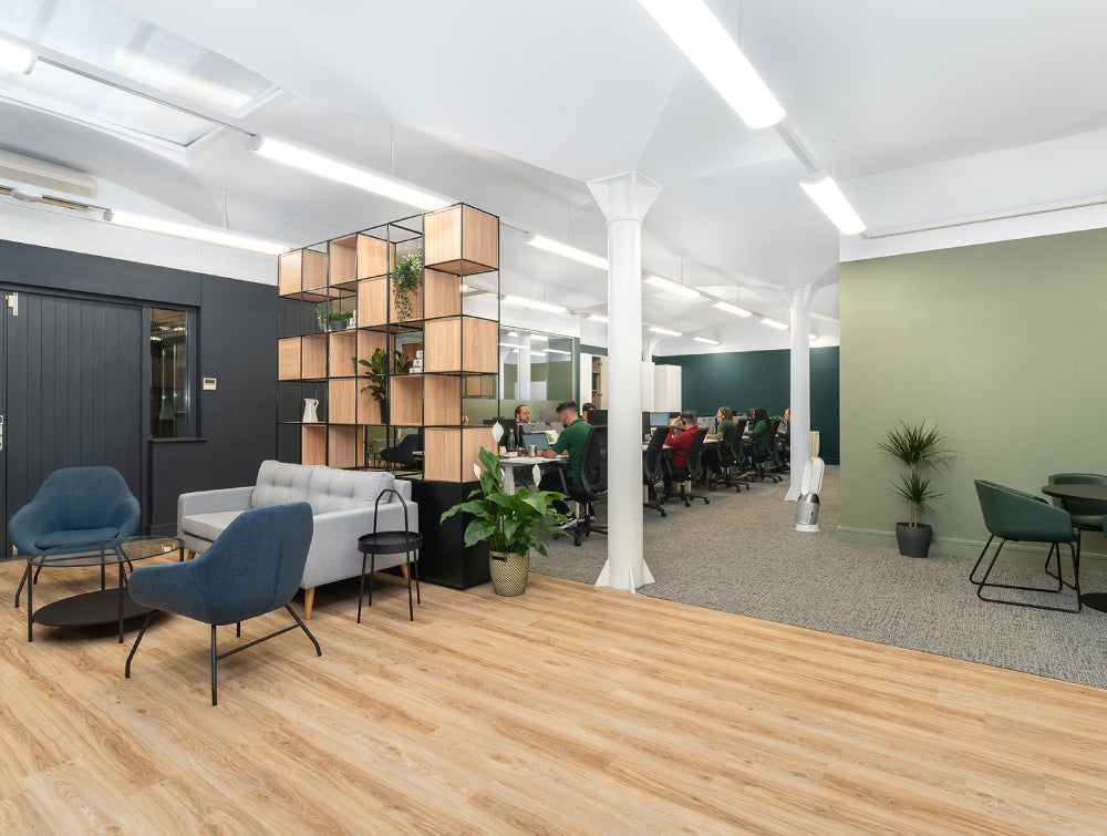Indoor Plant With Side Table And Loung Chair In Breakout Setting