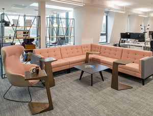 Jig Modular Low Back Soft Seating Range In Pink In Open Office Space With Foundry Metal Palisades