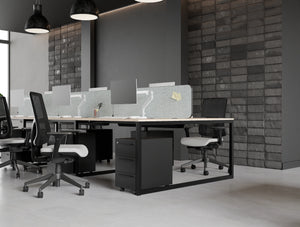 Key 3 Drawer Slimline Pedestal in Black Finish with Aria Ergonomic Chair and Light Desk Screen Attached in Key Bench Desk in Modern Office Setting