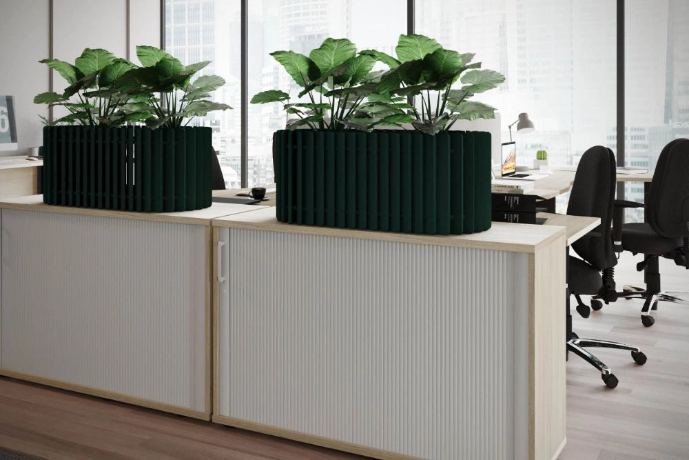 Koala Acoustic Counter Planter in Dark Green Finish Above Tambour Cupboard with Black Office Chair in Modern Office Setting