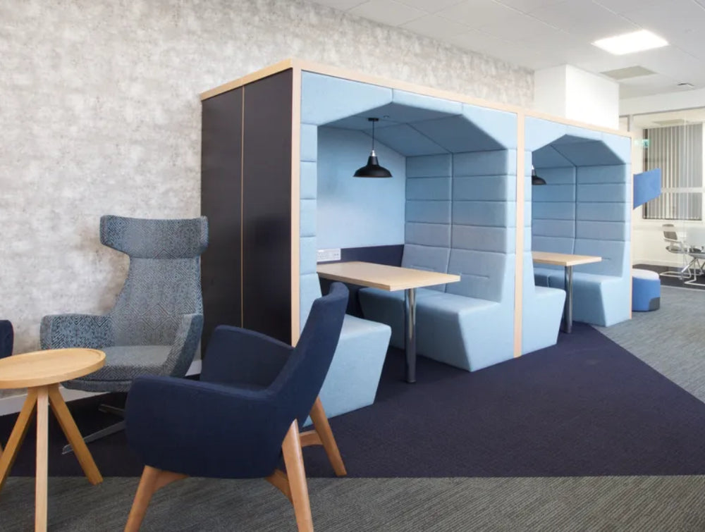 Open Meeting Pod Office Furniture With Wooden Coffee Table And High Back Lounge Chair In Breakout Setting