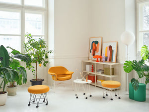 Pental Round Mobile Pouffe With Sit Stand Desk And Indoor Plant In Office Setting