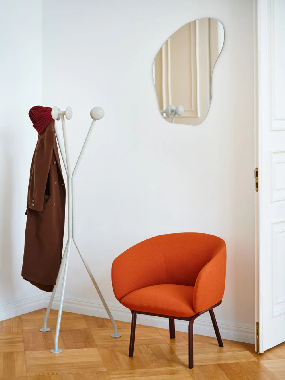 Ramo Coat Hanger with Wood Knob in White Finish with Orange Amrchair in Home Office Setting