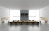 Rectangular Boardroom Table in Light Oak Finish with Task Chairs and Bookshelves in Modern Office Setting