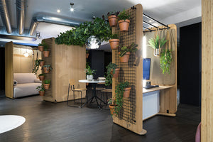 Retreat Media Centre Open Pod With Indoor Plants And Chairs In Breakout Setting