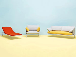 Reva Twist Lounge Outdoor Armchair 2 in White with Yellow Cushions in Lounge Area with Sofa and Chaise