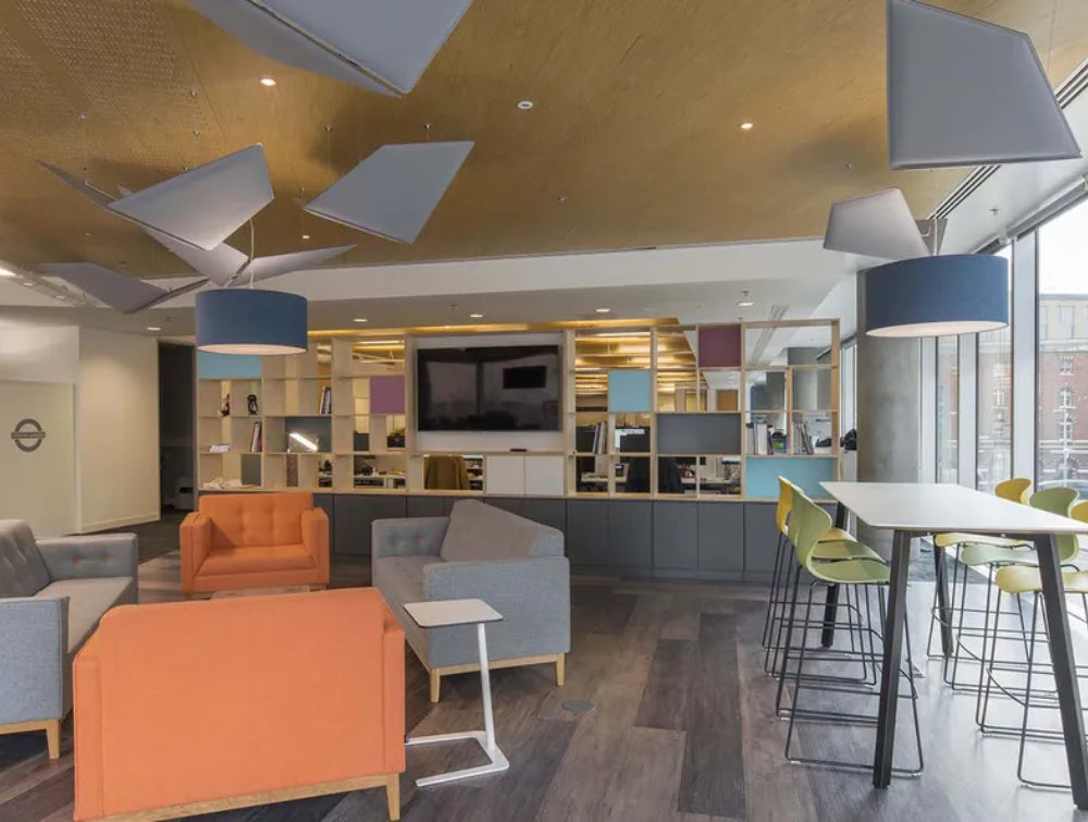 Upholstered Armchair Office Furniture In Orange Finish With High Table And Stool In Breakout Setting