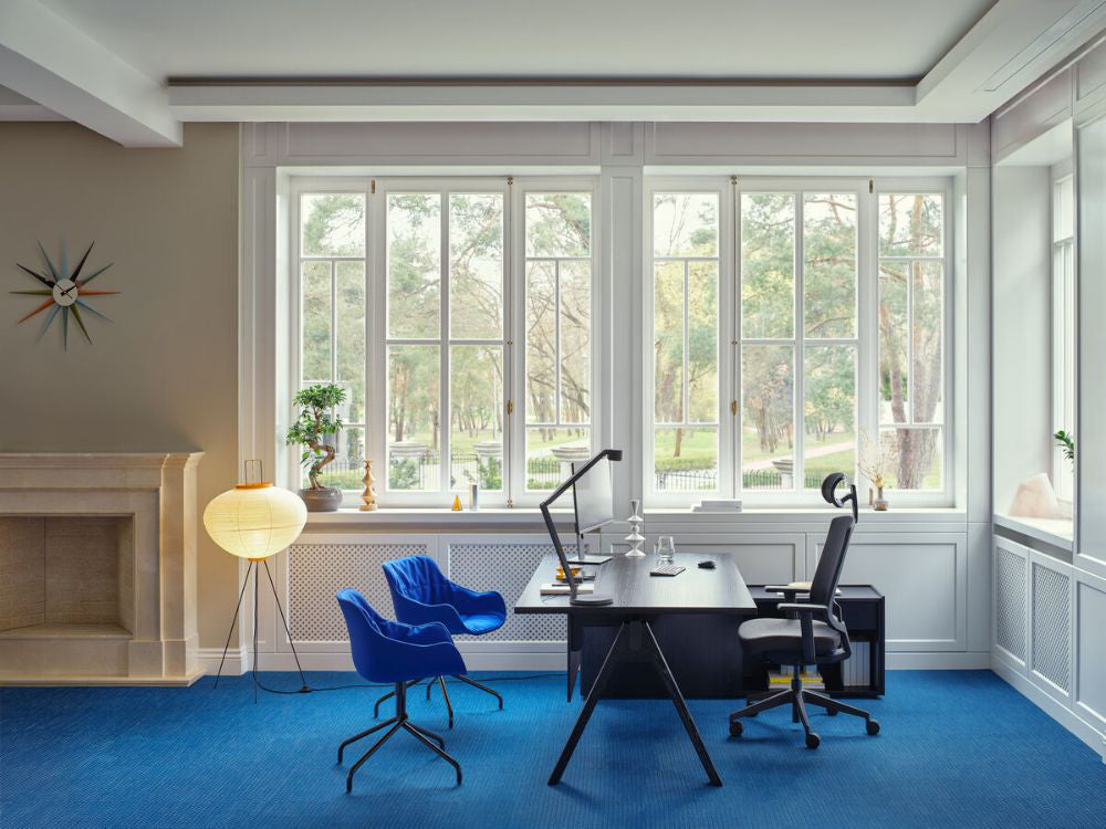 Viga Executive Desk With Tub Chair And Floor Lamp In Office Setting 2