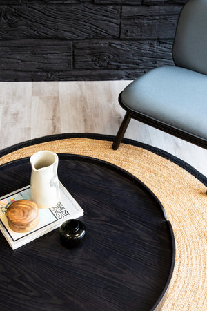 Wrapt Wooden Round Coffee Table With Lounge Chair And Rug In Breakout Setting 2