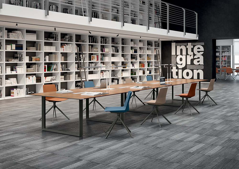 X7 Meeting Room Table with Swivel Chair and Bookshelves in Modern Office Setting